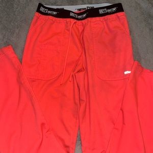 Bright, neon pink greys anatomy scrub pants